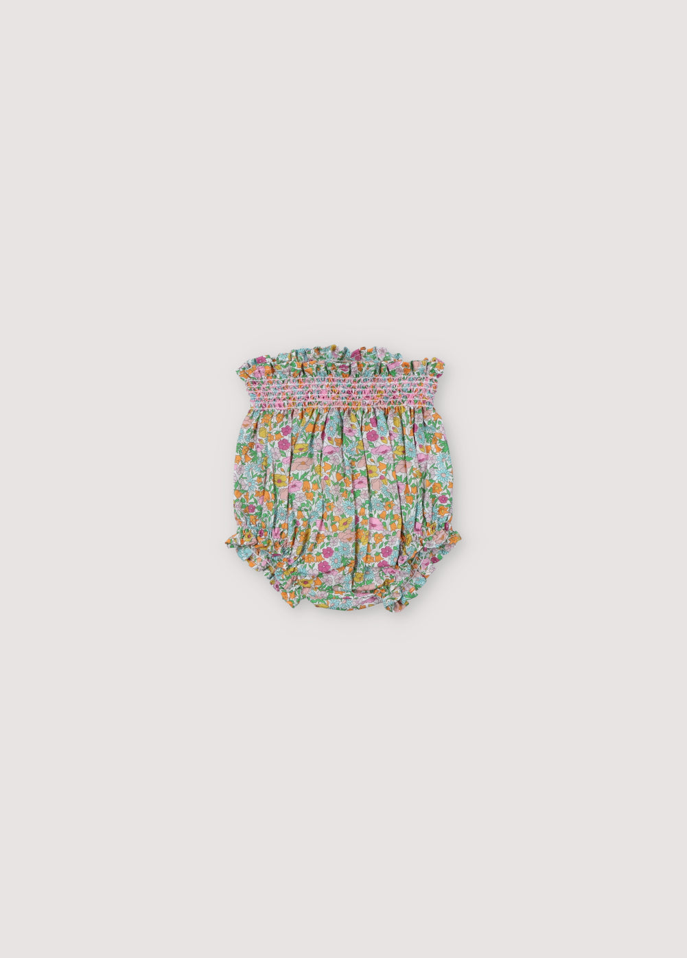 Andreas Bloomer in Liberty fabric with smoke-colored hibiscus thread to match the print and to generate volume in the garment. Small ruffle details. Spring Summer Collection. The New Society.
