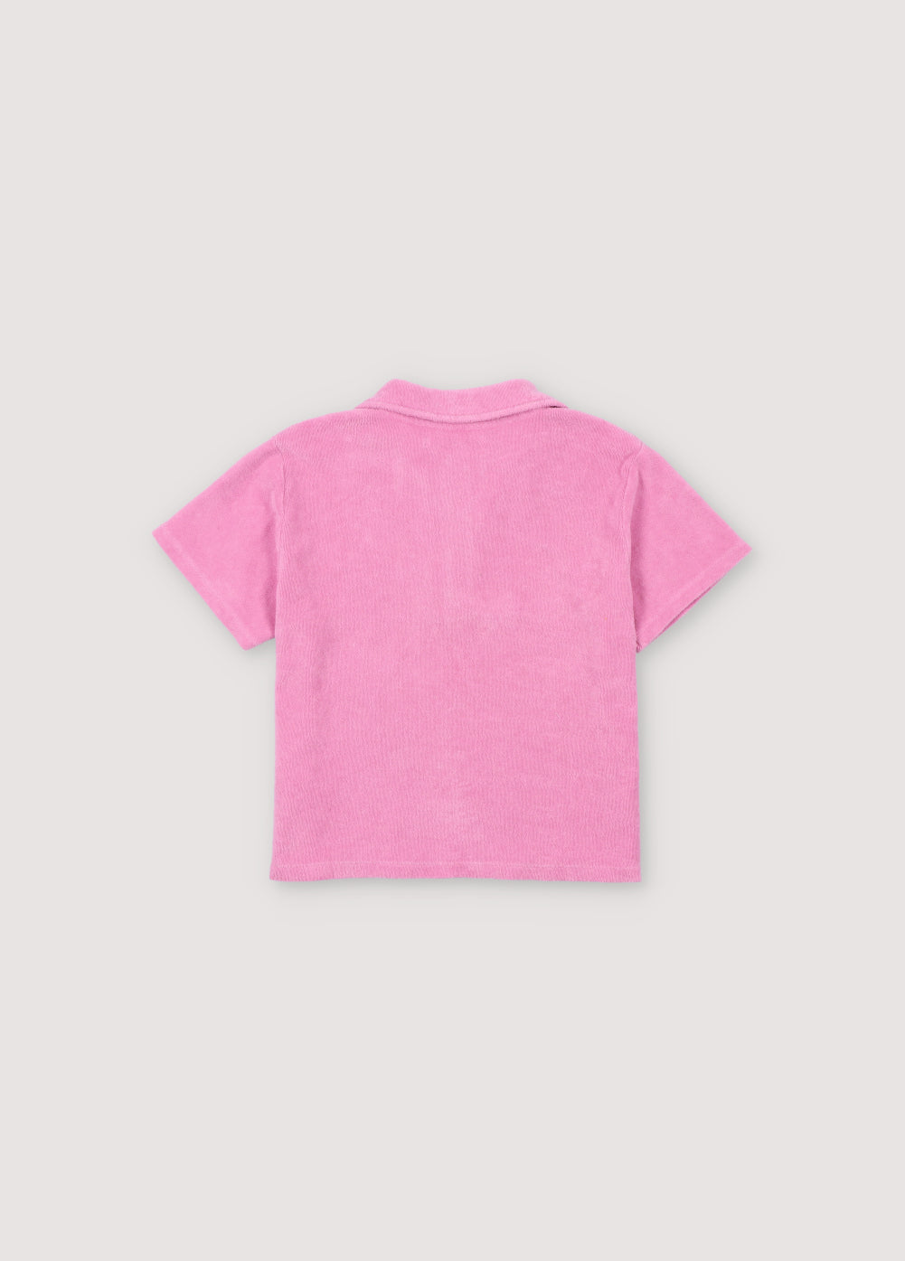 Terry fabric polo shirt with brand logo embroidery on the chest in a matching color. Perfect for pairing with the matching shorts to create a summery look. The New Society. kids collection