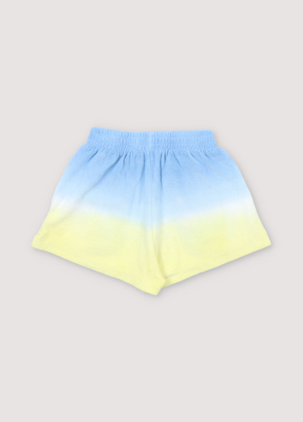 Tie-dye terry fabric shorts with elastic waistband and side opening detail. It can be paired with the matching polo to create a summery look.