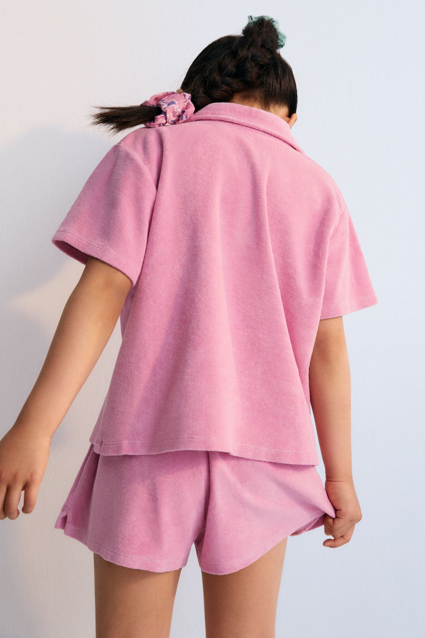 Briseis polo shirt with brand logo embroidery on the chest in a matching color. Perfect for pairing with the matching shorts to create a summery look. The New Society. kids collection