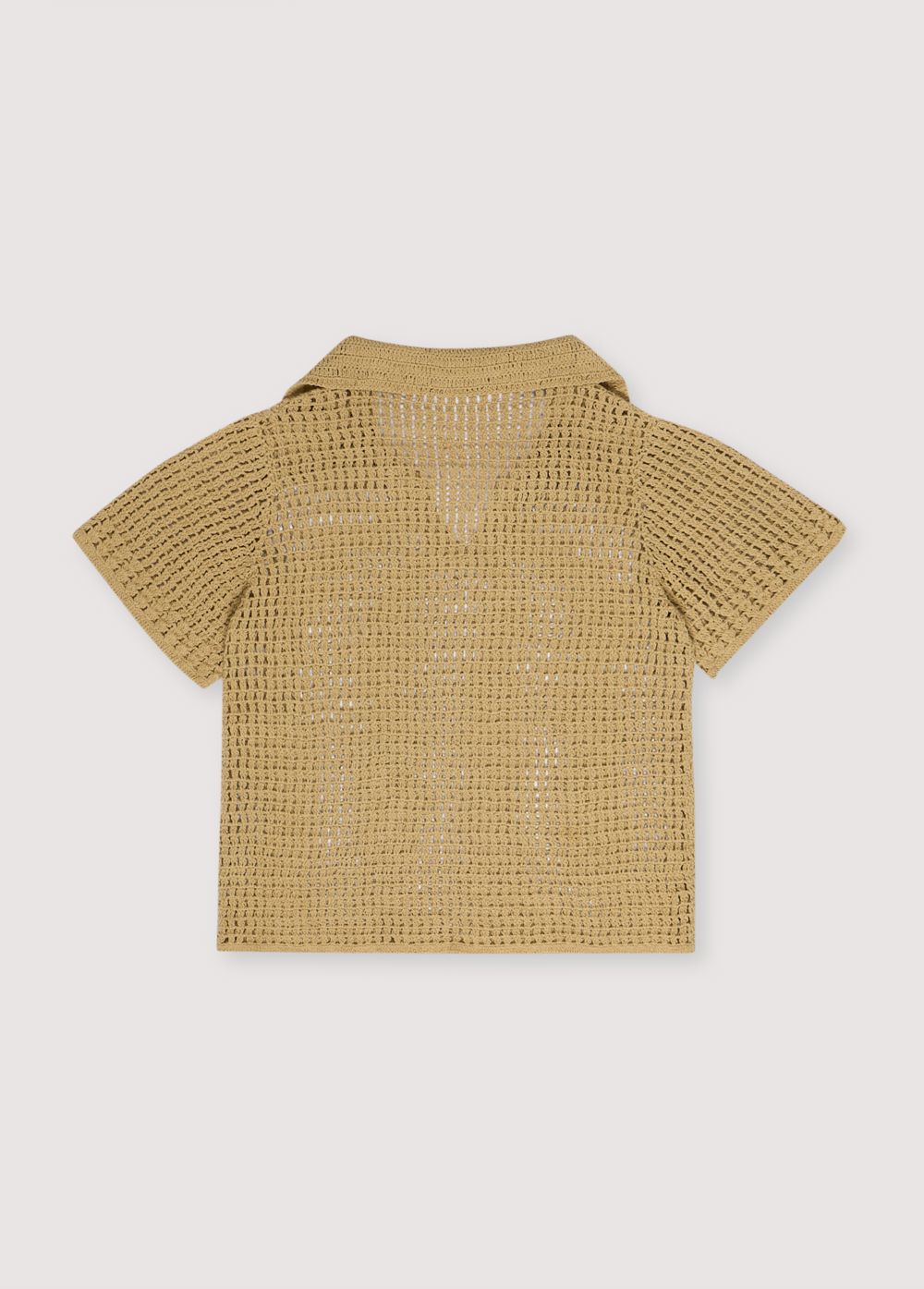 Short-sleeved polo entirely made of crochet. Spring Summer Collection. The New Society.