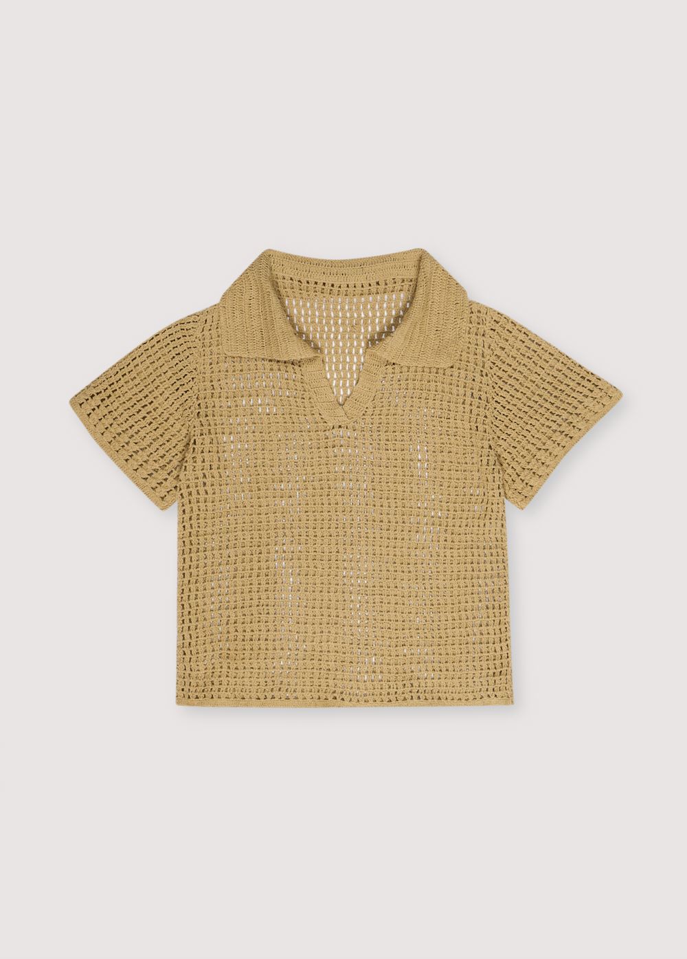Short-sleeved polo entirely made of crochet. Spring Summer Collection. The New Society.