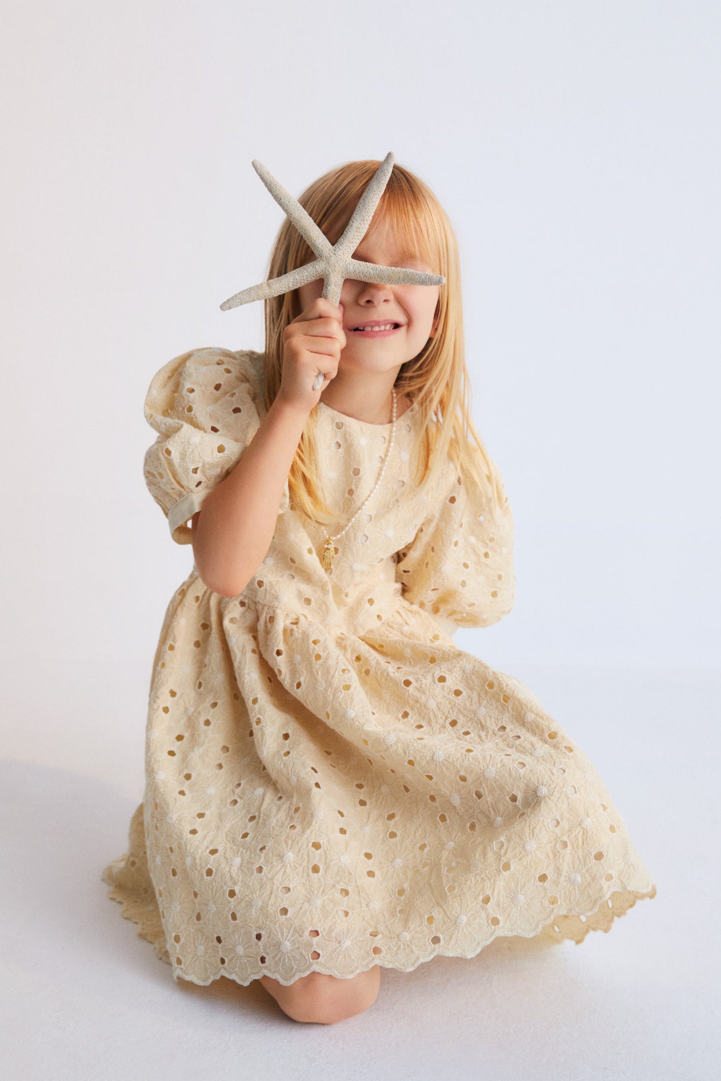 Creta Dress our bestseller now with embroidered blend cotton fabric in macadamia color. Dress with puffed sleeves and a flared skirt. New Collection Kids.