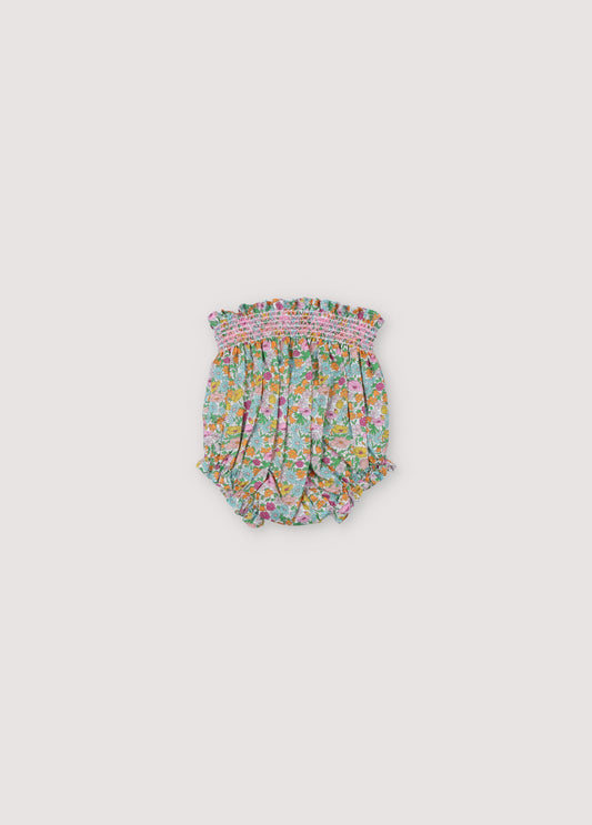 Andreas Bloomer in Liberty fabric with smoke-colored hibiscus thread to match the print and  to generate volume in the garment. Small ruffle details. Spring Summer Collection. The New Society.