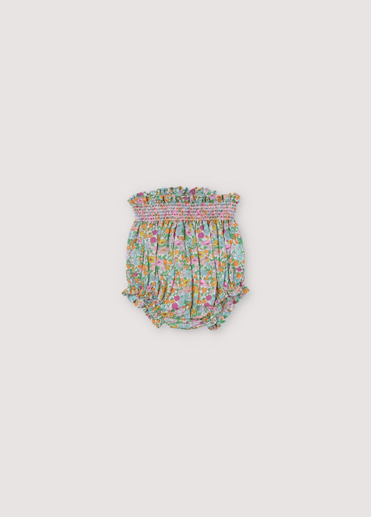 Andreas Bloomer in Liberty fabric with smoke-colored hibiscus thread to match the print and  to generate volume in the garment. Small ruffle details. Spring Summer Collection. The New Society.