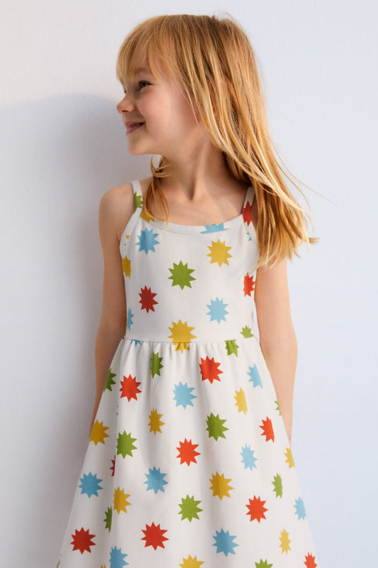 
Short jersey dress with multicolored star print, spaghetti straps, and gathered waist. New Collection. Spring Summer. The New Society.