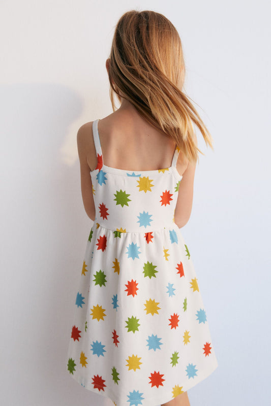 
Short jersey dress with multicolored star print, spaghetti straps, and gathered waist. New Collection. Spring Summer. The New Society.