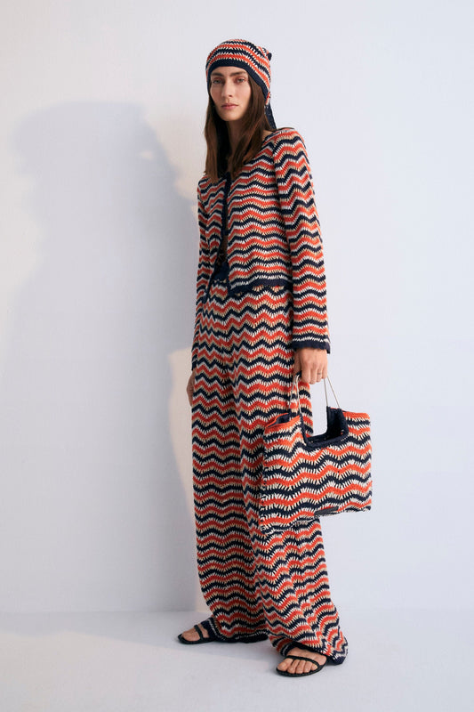 Long-sleeved tricolor crochet cardigan with front opening, curved finishes and  crochet tone-on-tone buttons. This is a perfect garment to pair with matching pants. Spring Summer Collection. The New Society. 