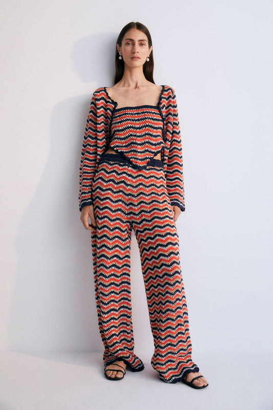 Tricolor crochet pants with curved finishes and elastic waistband. This is a perfect garment to pair with matching cardigan. Spring Summer Collection. The New Society.