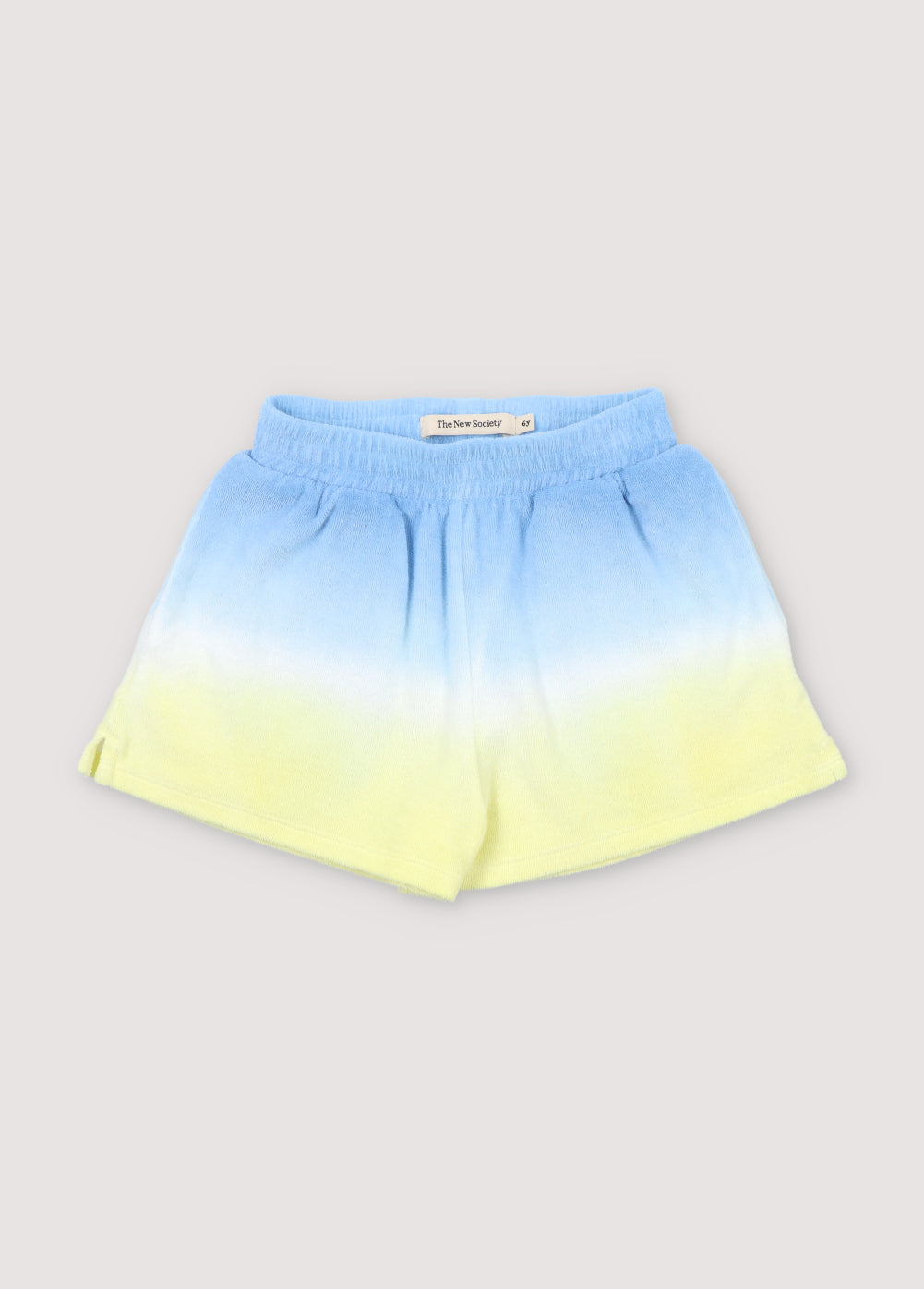 Tie-dye terry fabric shorts with elastic waistband and side opening detail. It can be paired with the matching polo to create a summery look.
