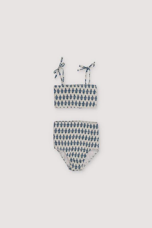 Bikini with stamp print and smocking on both pieces, featuring straps to tie on the shoulders.