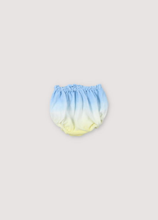 Baby bloomer made of terry fabric with tie dye and elastic legs and waist for a gathered effect. Perfect to combine with the matching T-shirt Spring Summer Collection. The New Society.