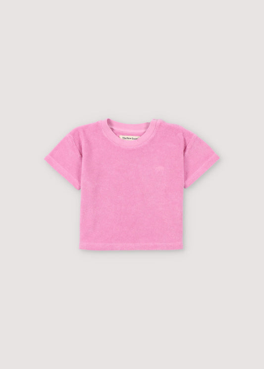Terry fabric shirt with ribbed collar and shoulder opening with tone-on-tone snaps. It features brand embroidery on the chest in a matching tone. Perfect for pairing with the matching bloomer. Spring Summer Collection. The New Society.