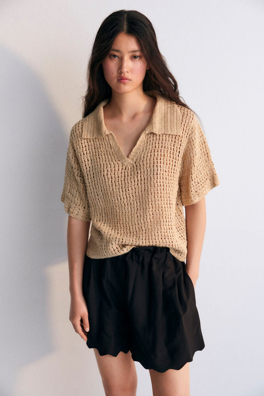 Short-sleeved polo entirely made of crochet. Spring Summer Collection. The New Society.