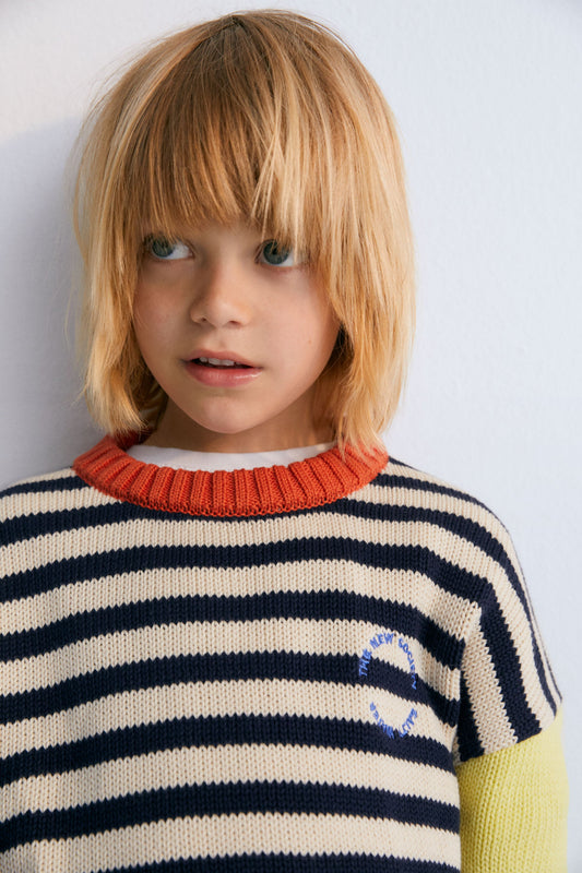 Fun and colorful cotton sweater with ribbed neckline, cuffs, and hem, featuring contrast brand embroidery on the chest. The New Society. Kids Collection. 