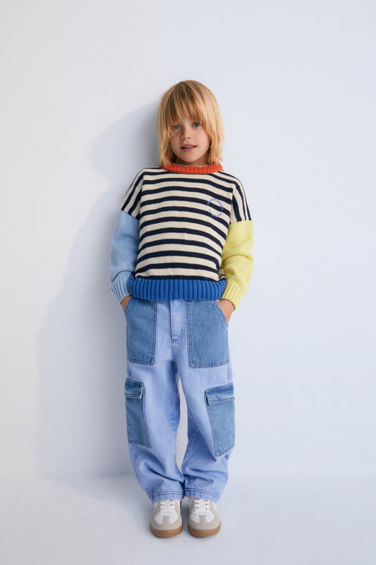 Fun and colorful cotton sweater with ribbed neckline, cuffs, and hem, featuring contrast brand embroidery on the chest. The New Society. Kids Collection.