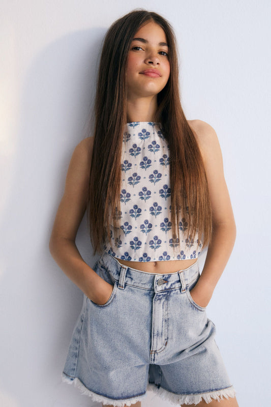 Chios Teen bermuda denim fabric in 100% cotton with distressing details on the sides. Spring Summer Collection. The New Society.