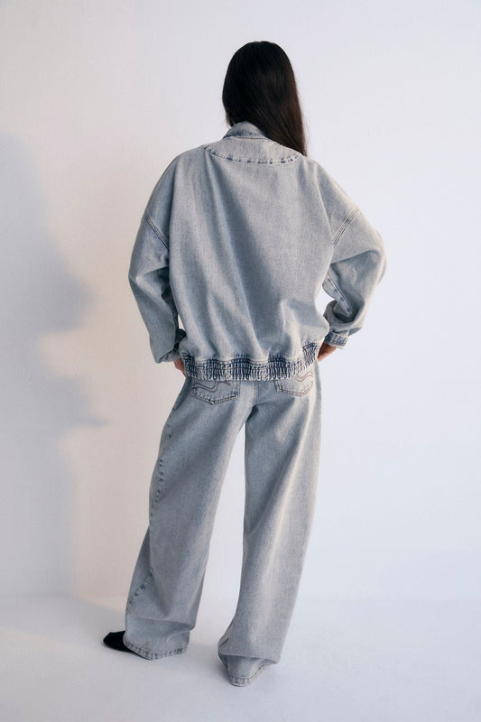 Chios Woman Bomber, our bestseller. Jacket in denim fabric 100% cotton, with front pockets and a central zipper. Spring Summer Collection. The New Society.
